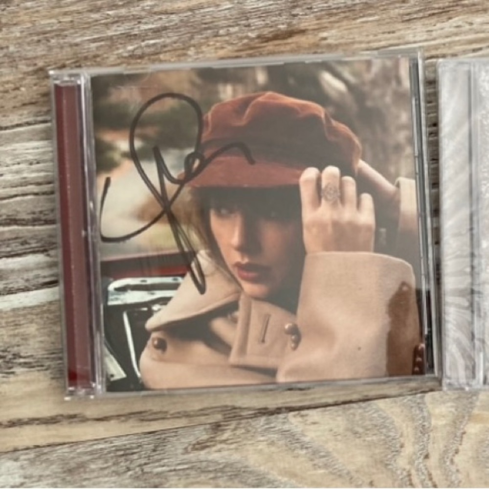 Taylor Swift signed RED (Taylor’s version) CD.